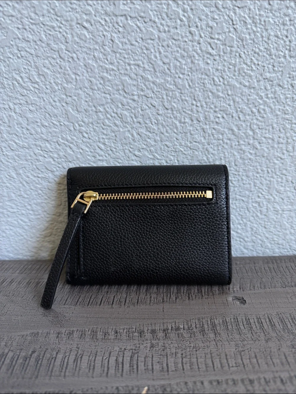 Tory Burch features dimensions